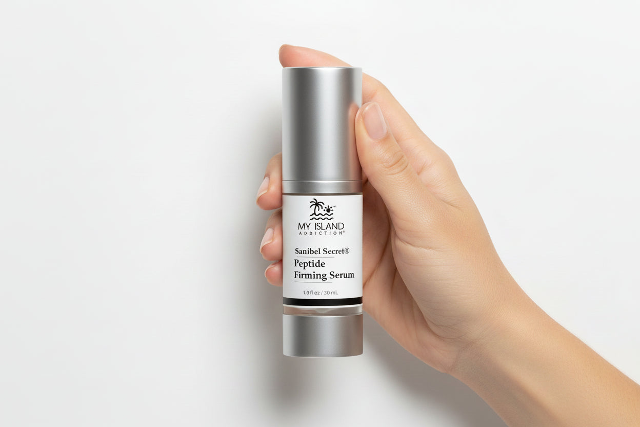 Skincare serum bottle labeled 'Sanibel Secret Peptide Firming Serum' by My Island Addiction on a white background.