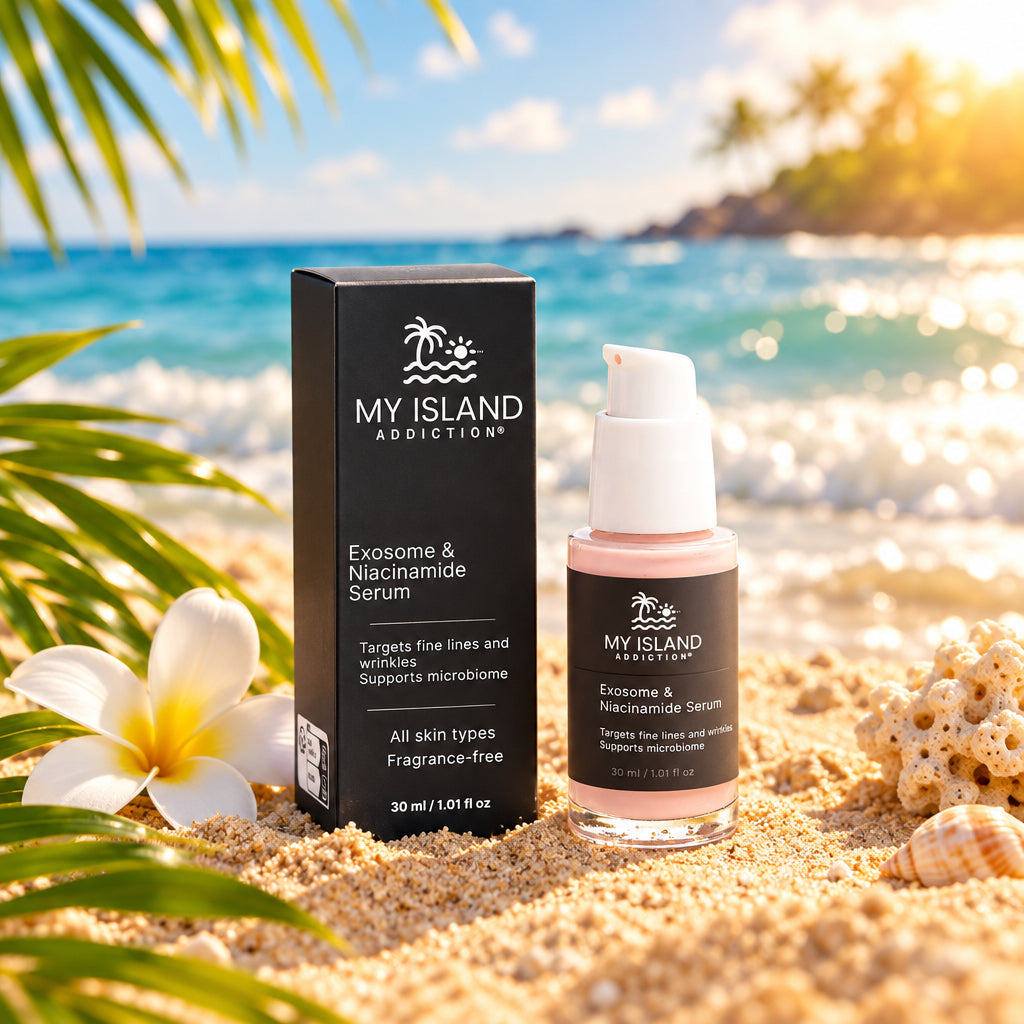 My Island Addiction Exosome & Niacinamide Serum, 30 ml serum in glass pump bottle beside black box on a sunny beach in the sand.